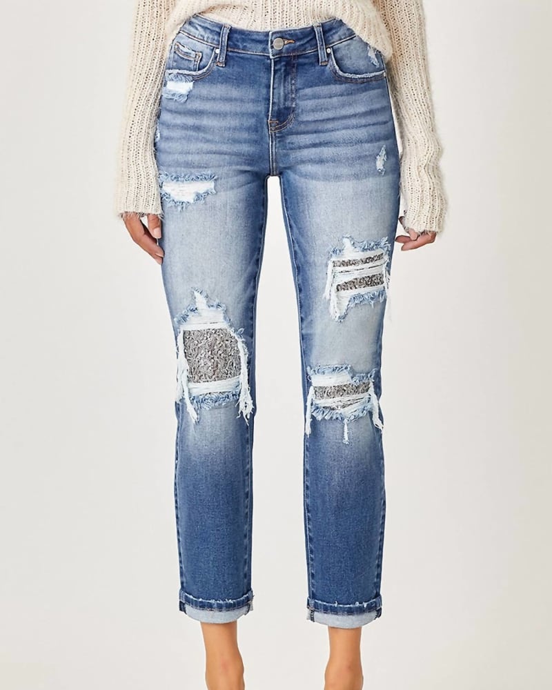Front of a model wearing a size 20 Midrise Sequins Patched Straight Jean in Blue in Blue by RISEN. | dia_product_style_image_id:326172